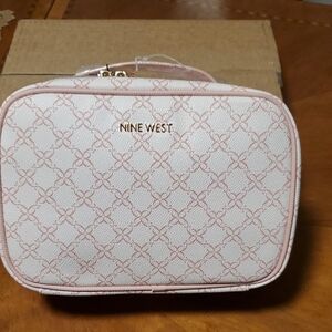 NINE WEST COSMETIC PINK AND WHITE COLOR BAG.